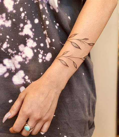Subtle And Elegant Vine Tattoo Design