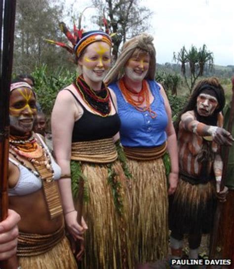 The papua new guinea flag emoji is divided diagonally from left to right into two sections in black and red. A Papua New Guinea wedding: Face paint, grass aprons and ...