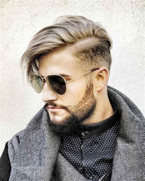 Having resemblance to the slicked back undercut, this hairstyle is perfect for those having long hair at the top which can help this undercut hairstyle men is inspired by the mohawk style, where the hair is styled with a steeply angled haircut to resemble that of a mohawk. Undercut hairstyle for men - super cool ideas for a truly ...