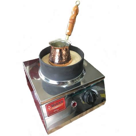 Turkish grind coffee is finer than beach sand. Mizan Coffee in Sand Machine