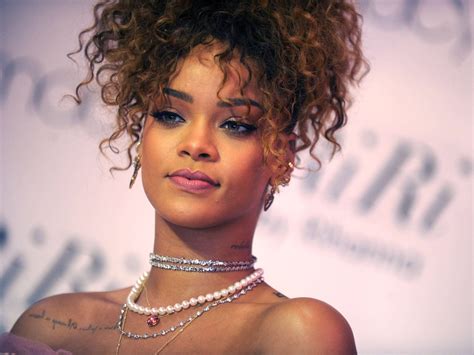 Download Rihanna At A Riri Event Wallpaper