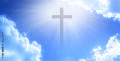 Christian Cross Appeared Bright In The Sky With Soft Fluffy Clouds
