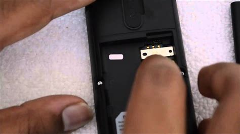 How to insert / remove a sim card in various mobile cell. How to Insert SIM card into Nokia 106 - YouTube