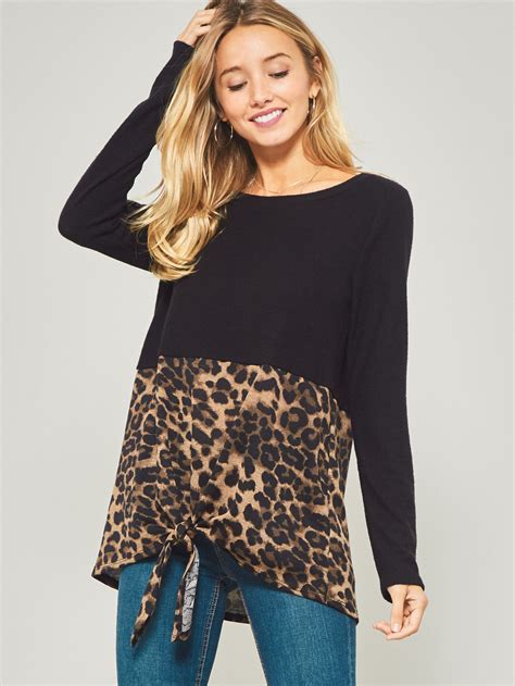 DT2326 A leopard print color block knit top featuring round neckline ...