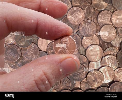 Us Penny Pennies Hand Hold Coin Hi Res Stock Photography And Images Alamy