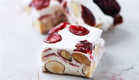 This is a very easy recipe, requiring no candy thermometer and no sensitive tempering of the chocolate. Soft Cranberry & Almond Nougat | Queen Fine Foods