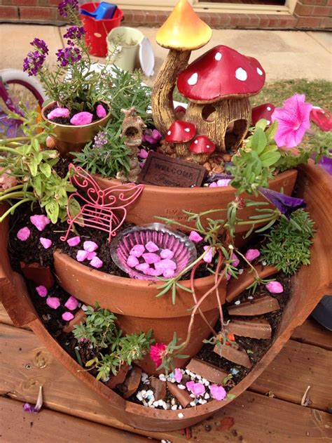 Diy fairy garden | in most cases a broken flower pot's fate is usually sealed and it can expect to end up on a pile of garbage. How to Make a Broken Clay Pot Fairy Garden - BigDIYIdeas.com