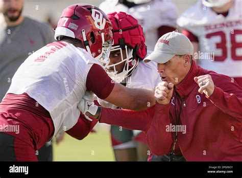 Oklahoma Head Coach Brent Venables Works With Players During An Ncaa