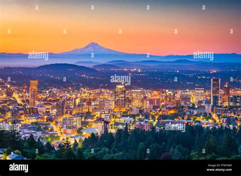 Portland Oregon Usa Skyline At Dusk With Mt Hood In The Distance