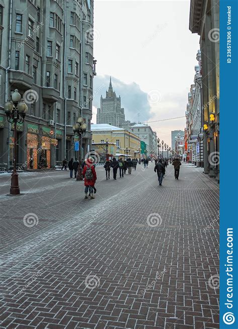New Arbat In Moscow People Walk Along The Paving Of A Wide Street