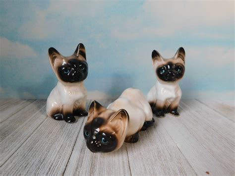 Top rated seller top rated seller. Vintage Set of 3 Bone China Siamese Cats Figurines ...