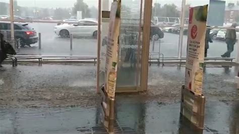 Shoppers Stuck Inside Tesco After Store Floods Following Heavy