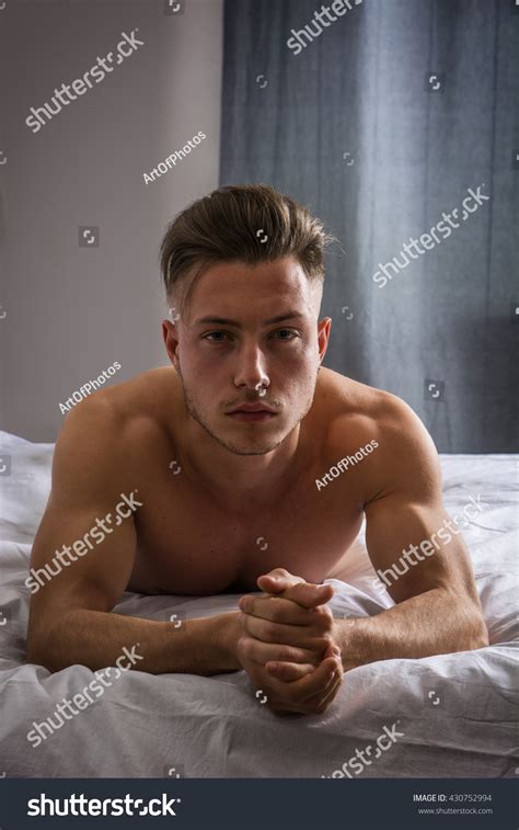 shirtless sexy male model lying alone 스톡 사진 430752994 shutterstock
