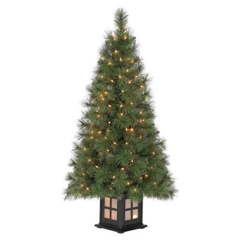 The tips of the branches are painted white to create a naturally falling snow visual effect. Holiday Living 4-ft Pre-lit Scott Pine Slim Artificial ...
