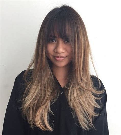 Balancing the entire layered hair installation with long bangs can be done frontally or sidewise. 21 Cute, Effortless Long Hairstyles with Bangs and Layers - Hairstyles Weekly