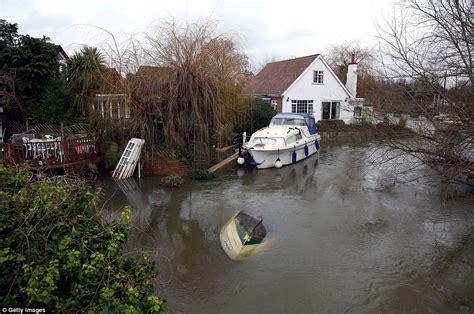 Extraordinary Photographs Of River Thames Homes Which Are Still Flooded