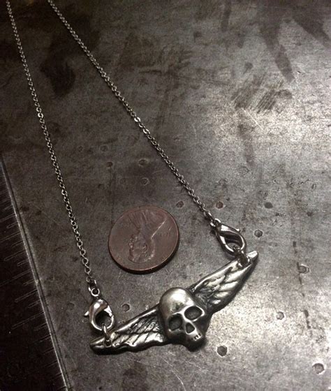Airborne Skull With Wings Hand Cast In White Bronze Flying