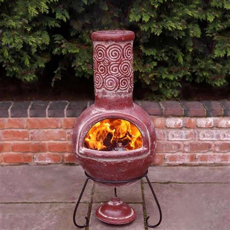 Enjoy memorable moments with people you love when you gather around a cosy firepit whatever the season. Clay Fire Pit Chimney | Fire Pit Design Ideas