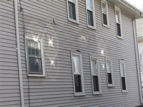 Melted Vinyl Siding Caused By Reflected Sunlight Structure Tech Home