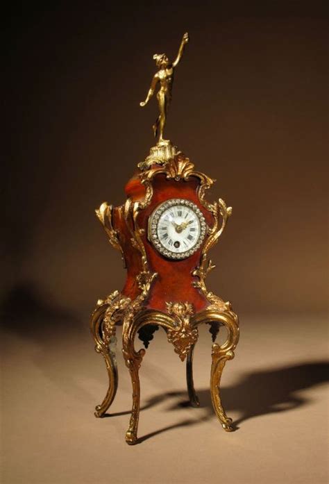 A Very Decorative French Simulated Tortoiseshell Mantel Clock Circa