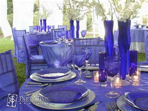 An attractive table adds to the enjoyment of a meal. This blue table setting works just right for blue-themed ...