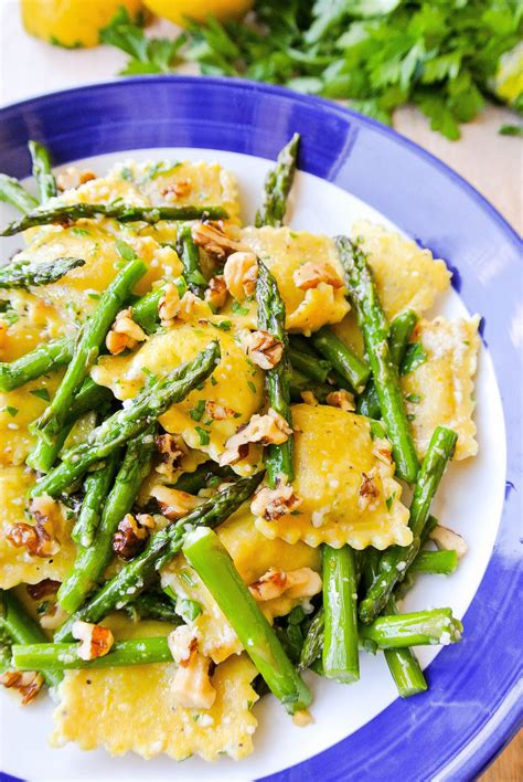 Serve over the ravioli and sprinkle with the parmesan. {ravioli with asparagus + walnuts in a lemon-brown butter ...