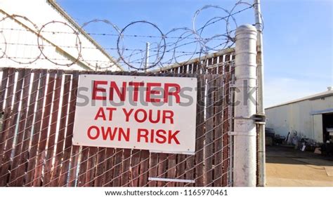 Enter Your Own Risk Sign On Stock Photo 1165970461 Shutterstock