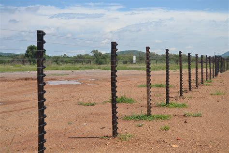 An electric fence is a barrier that uses electric shocks to deter animals and people from crossing a boundary. Freestanding E/fence | Manase