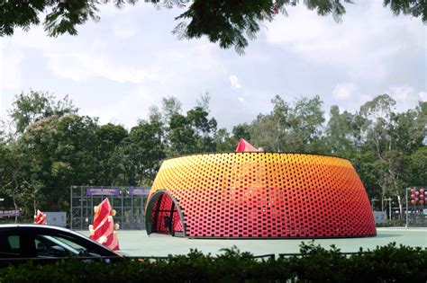 Daydreamers Design Creates Flame Coloured Pavilion From Recycled