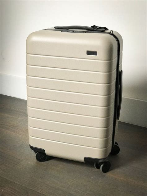 Photos And Features Of The Away Suitcase With Phone Charger Business