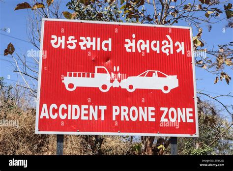 Road Signage Board With Fonts Accident Prone Zone On Red Board Stock