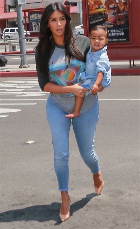 'i had such a hairy neck'. Kim Kardashian shows off baby North's adorable new slick ...