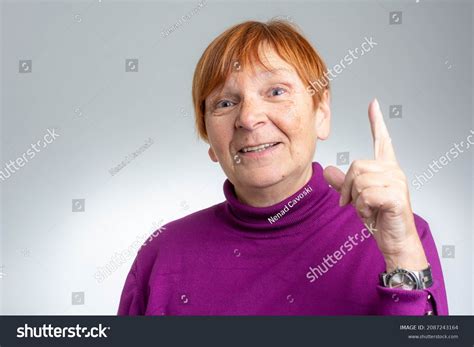 Smiling Mature Woman Pointing Finger Isolated Stock Photo 2087243164