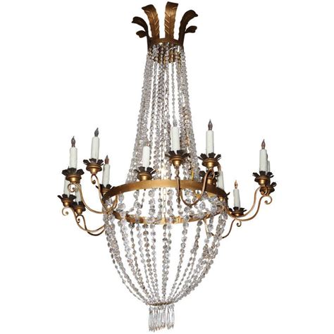 Whether you're going for a contemporary design or a more rustic look, there is a chandelier out there that can give you the look you want. Crystal and Gilt Metal Chandelier w/ Wax Candle Covers at ...