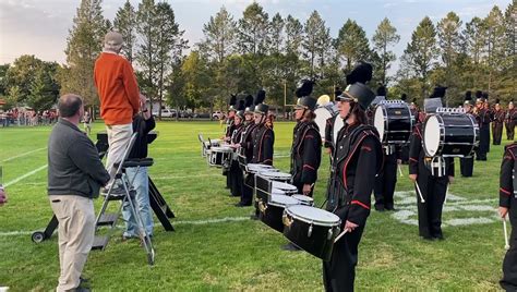 John Chown leads the Escanaba Eskymos once again in the National Anthem