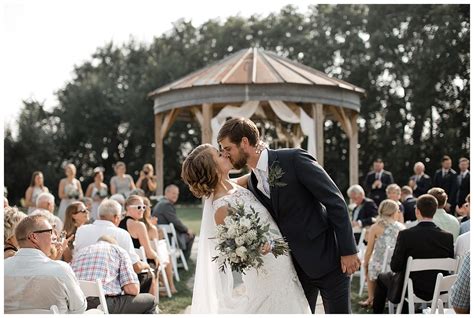 Bride And Groom Walking Down The Aisle Modern And Rustic Outdoor Barn