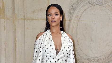 Rihanna Shuts Down Paris Fashion Week In A Wedding Worthy Dress