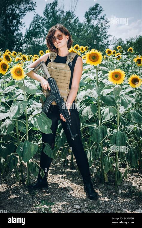 Beautiful And Attractive Woman Soldier With Rifle Machine Gun Female