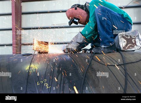 Workers At Hyojong Pipe Factory Doha Stock Photo Alamy