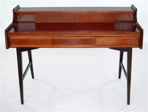 It's the perfect addition to any bedroom or office area and will help students or professionals store their materials and stay organized. Italian Mid-Century Modern Writing Desk with Compartments ...