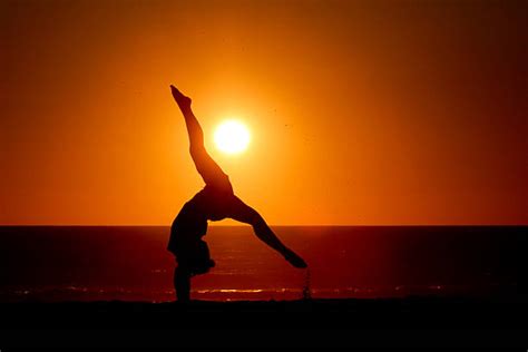 Woman Cartwheels Silhouette Stock Photos Pictures And Royalty Free