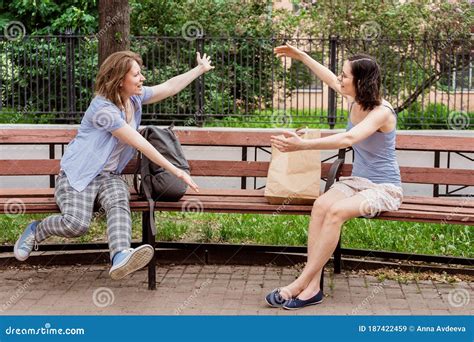 Friends Meet Each Other In The Park Stock Image Image Of Greeting Modern 187422459