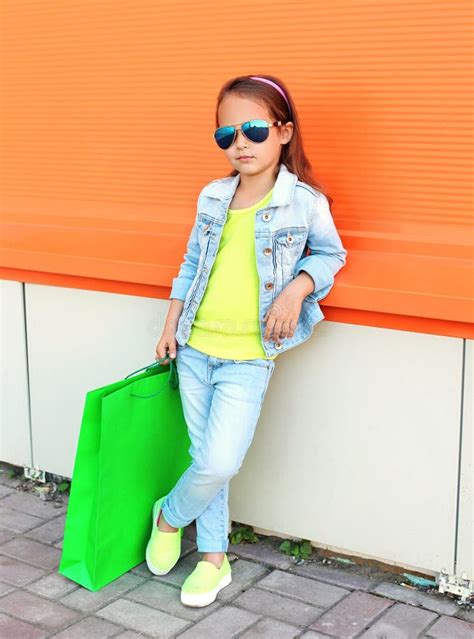 Pretty Little Girl Child Wearing Jeans Clothes Shopping Bags Stock