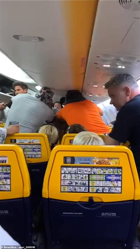 Shocking Footage Shows Two Men Brawling On Ryanair Plane After Argument Over Seat Daily Mail