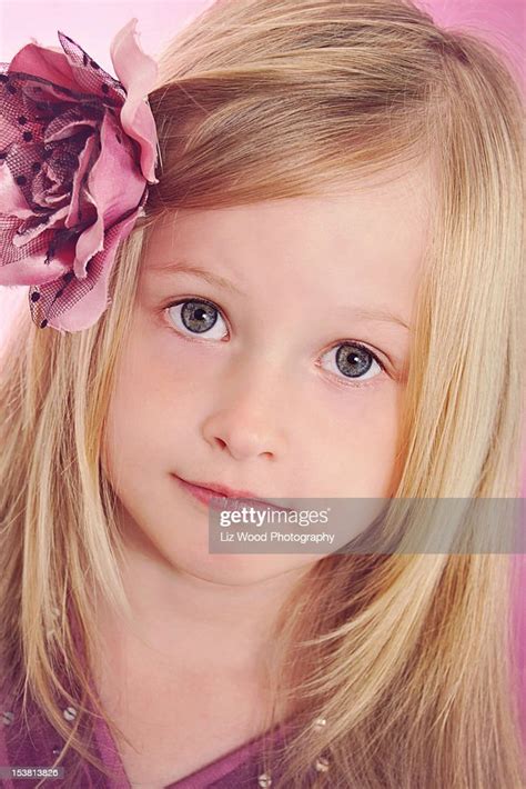 Girl With Blonde Hair Pink Rose In Hair High Res Stock Photo Getty Images
