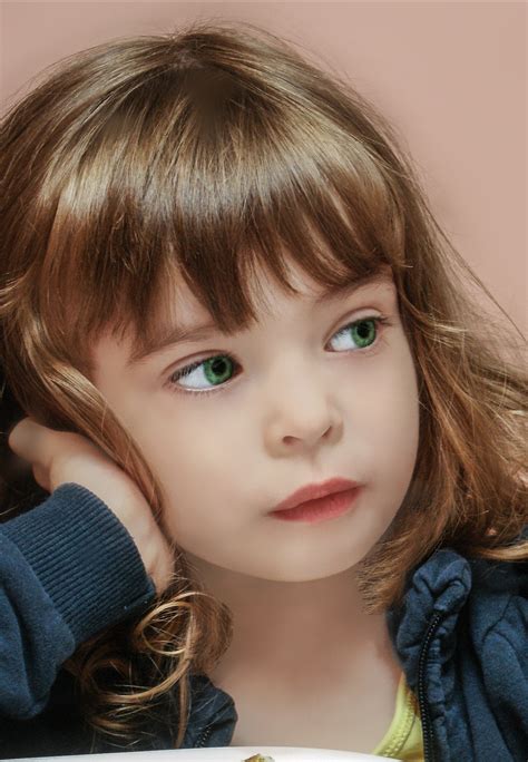 Little Girl With Brown Hair Blue Eyes