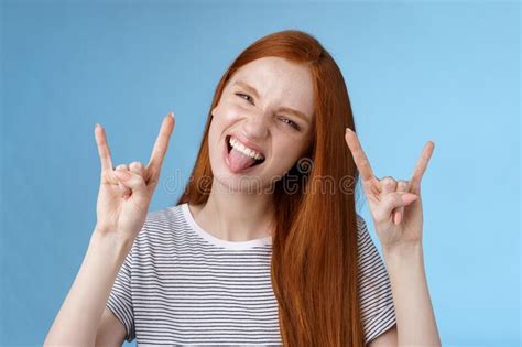 Daring Carefree Playful Excited Good Looking Funny Redhead Girl Having Fun Show Tongue Squinting