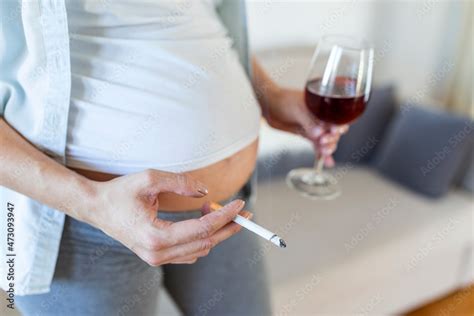 smoking and alcohol pregnancy woman on a long pregnancy drinking alcohol and smoking cigarettes