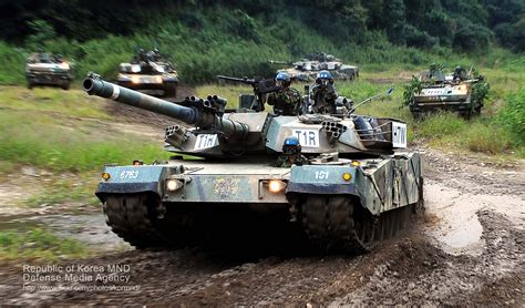 South Korean Army K 1 Main Battle Tank Rolling Through Mud 2048 X 1202