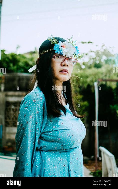 Portrait Of Young Woman Looking Away Stock Photo Alamy